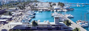 Aerial view of Alimos Marina in Athens with white yachts and clear turquoise water