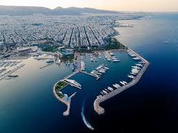 Aerial view of Marina Flisvos in Athens with luxury yachts docked in deep blue water